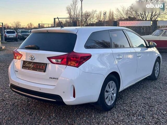 Тойота Аурис, объемом двигателя 1.4 л и пробегом 195 тыс. км за 8999 $, фото 4 на Automoto.ua