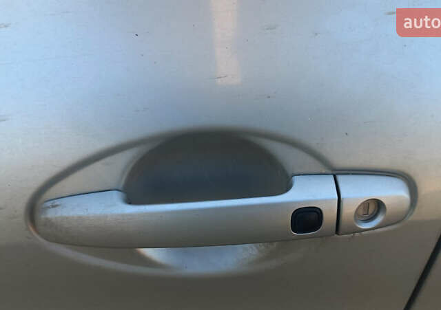 Серый Тойота Аурис, объемом двигателя 2 л и пробегом 318 тыс. км за 5300 $, фото 2 на Automoto.ua