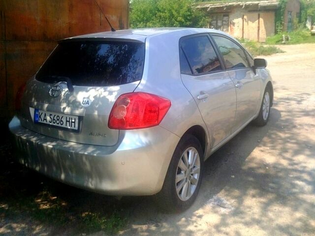 Сірий Тойота Ауріс, об'ємом двигуна 1.6 л та пробігом 244 тис. км за 7300 $, фото 4 на Automoto.ua