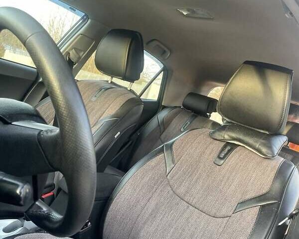 Сірий Тойота Ауріс, об'ємом двигуна 1.36 л та пробігом 143 тис. км за 8500 $, фото 6 на Automoto.ua