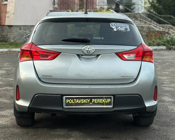 Сірий Тойота Ауріс, об'ємом двигуна 1.33 л та пробігом 202 тис. км за 8900 $, фото 6 на Automoto.ua