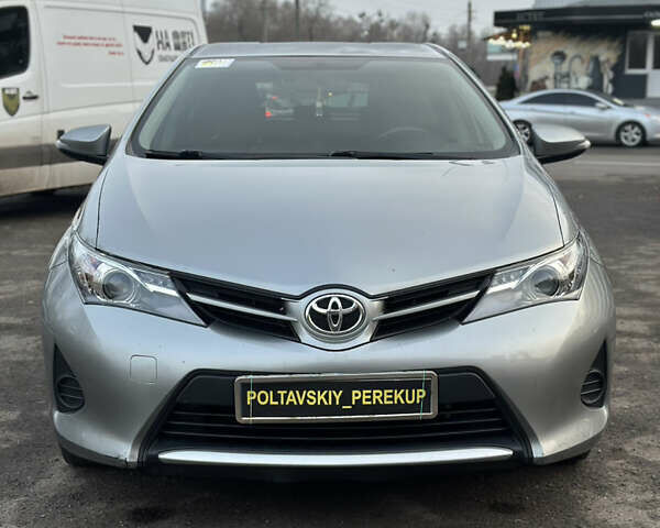 Сірий Тойота Ауріс, об'ємом двигуна 1.33 л та пробігом 202 тис. км за 8900 $, фото 1 на Automoto.ua