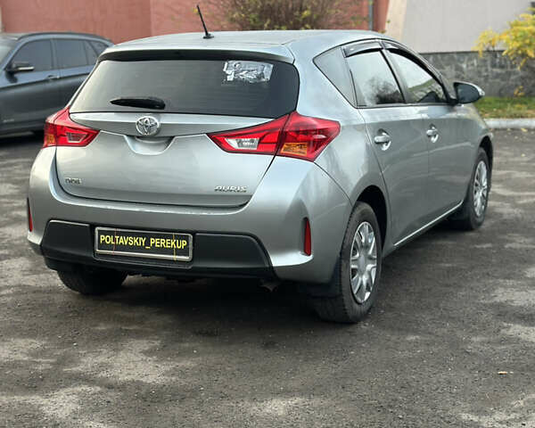 Сірий Тойота Ауріс, об'ємом двигуна 1.33 л та пробігом 202 тис. км за 8900 $, фото 7 на Automoto.ua