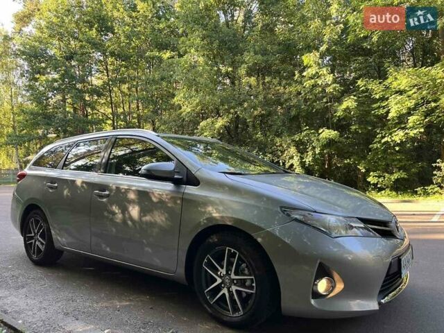 Сірий Тойота Ауріс, об'ємом двигуна 1.36 л та пробігом 215 тис. км за 8300 $, фото 8 на Automoto.ua