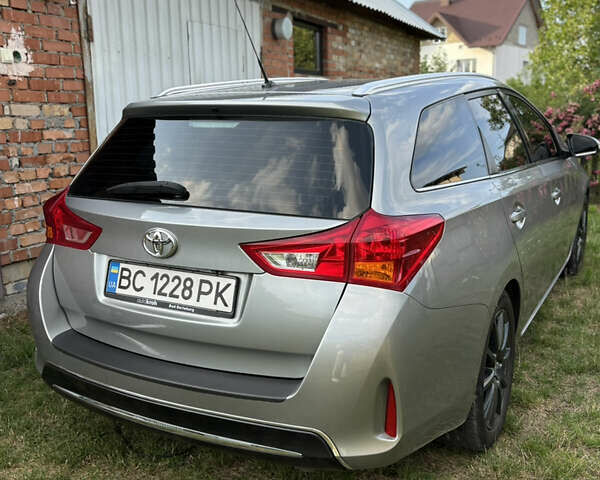 Сірий Тойота Ауріс, об'ємом двигуна 2 л та пробігом 225 тис. км за 11000 $, фото 6 на Automoto.ua