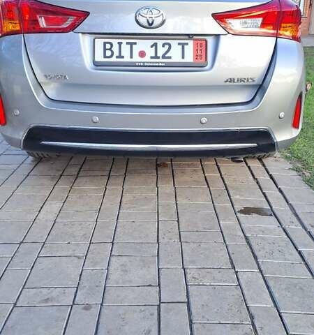 Сірий Тойота Ауріс, об'ємом двигуна 2 л та пробігом 255 тис. км за 12500 $, фото 1 на Automoto.ua