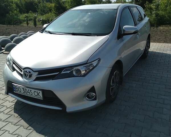 Серый Тойота Аурис, объемом двигателя 1.36 л и пробегом 252 тыс. км за 9200 $, фото 1 на Automoto.ua