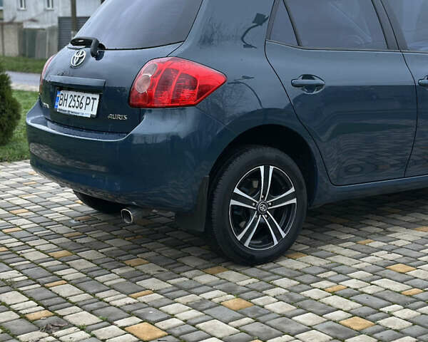 Синій Тойота Ауріс, об'ємом двигуна 1.6 л та пробігом 171 тис. км за 6990 $, фото 7 на Automoto.ua