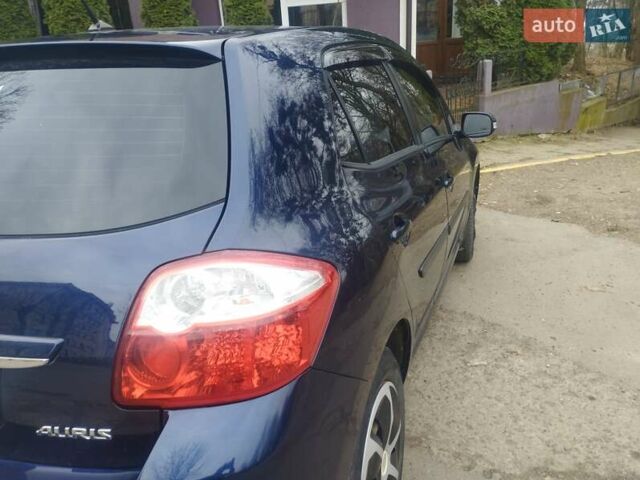 Синій Тойота Ауріс, об'ємом двигуна 2 л та пробігом 211 тис. км за 6800 $, фото 14 на Automoto.ua
