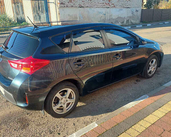 Синий Тойота Аурис, объемом двигателя 1.33 л и пробегом 154 тыс. км за 9299 $, фото 8 на Automoto.ua