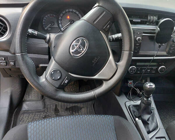 Синий Тойота Аурис, объемом двигателя 1.33 л и пробегом 154 тыс. км за 9299 $, фото 17 на Automoto.ua