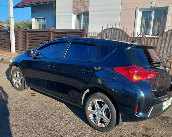 Синий Тойота Аурис, объемом двигателя 1.33 л и пробегом 154 тыс. км за 9299 $, фото 5 на Automoto.ua