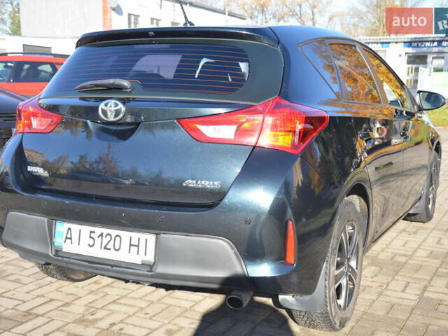 Зеленый Тойота Аурис, объемом двигателя 1.4 л и пробегом 160 тыс. км за 8800 $, фото 5 на Automoto.ua