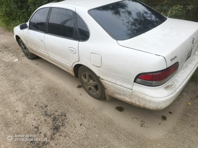 Білий Тойота Авалон, об'ємом двигуна 3 л та пробігом 316 тис. км за 2502 $, фото 1 на Automoto.ua
