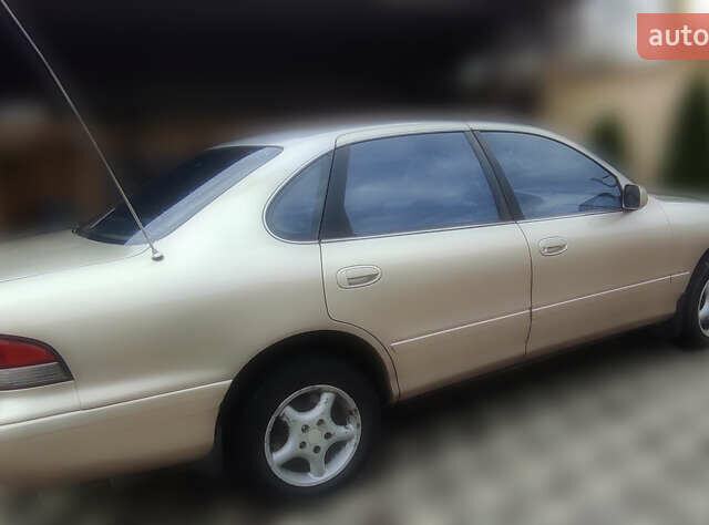 Бежевый Тойота Авалон, объемом двигателя 3 л и пробегом 143 тыс. км за 3200 $, фото 1 на Automoto.ua