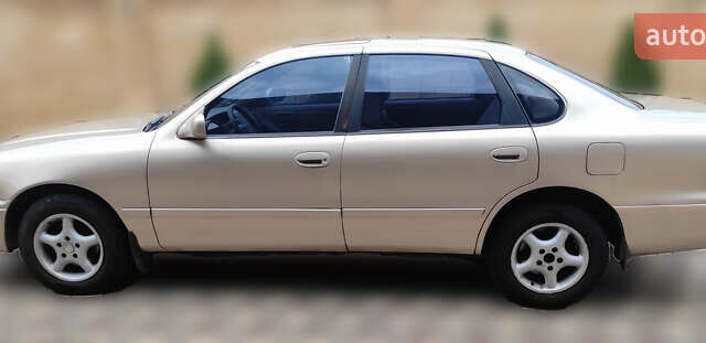 Бежевый Тойота Авалон, объемом двигателя 3 л и пробегом 143 тыс. км за 3200 $, фото 5 на Automoto.ua