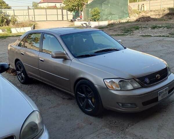 Бежевый Тойота Авалон, объемом двигателя 3 л и пробегом 398 тыс. км за 6500 $, фото 1 на Automoto.ua