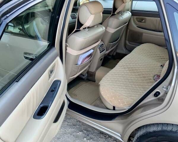 Бежевый Тойота Авалон, объемом двигателя 3 л и пробегом 398 тыс. км за 6500 $, фото 4 на Automoto.ua