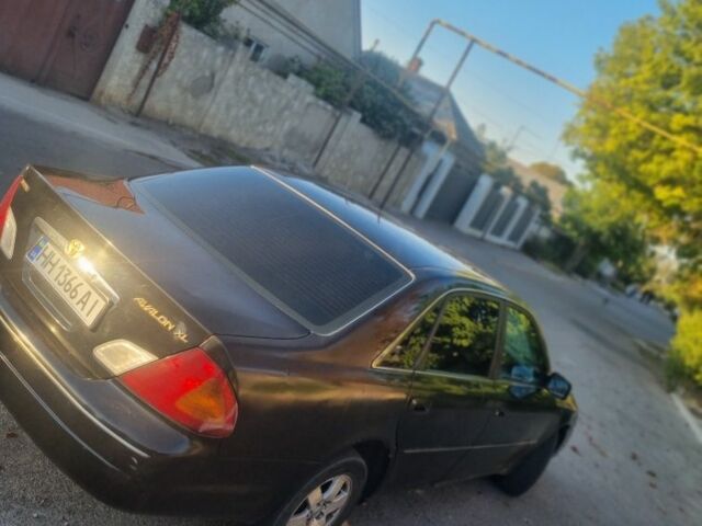 Черный Тойота Авалон, объемом двигателя 3 л и пробегом 250 тыс. км за 2450 $, фото 5 на Automoto.ua