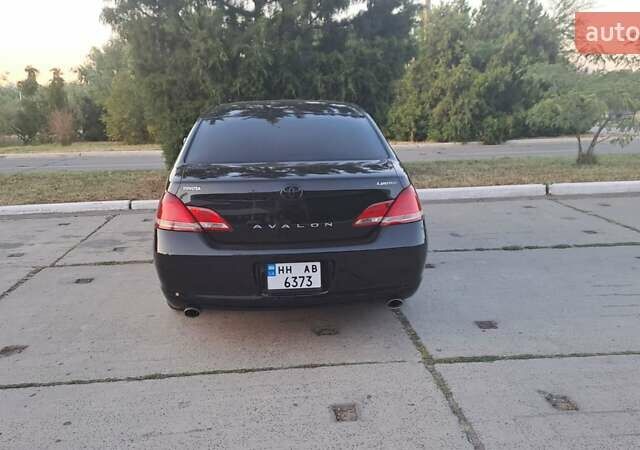 Черный Тойота Авалон, объемом двигателя 3.5 л и пробегом 310 тыс. км за 7599 $, фото 2 на Automoto.ua