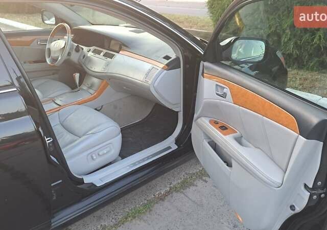 Черный Тойота Авалон, объемом двигателя 3.5 л и пробегом 310 тыс. км за 7599 $, фото 4 на Automoto.ua