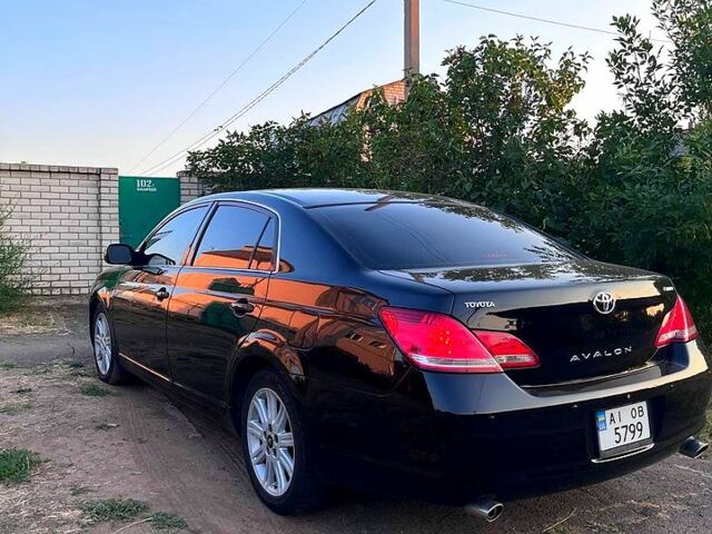 Черный Тойота Авалон, объемом двигателя 3.5 л и пробегом 227 тыс. км за 8300 $, фото 2 на Automoto.ua