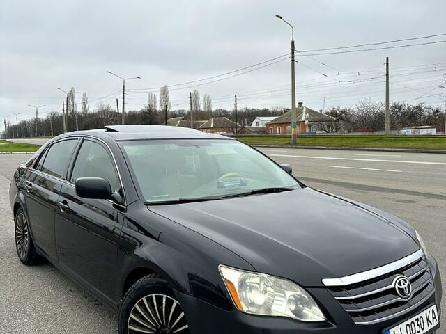 Черный Тойота Авалон, объемом двигателя 3.5 л и пробегом 350 тыс. км за 6299 $, фото 1 на Automoto.ua