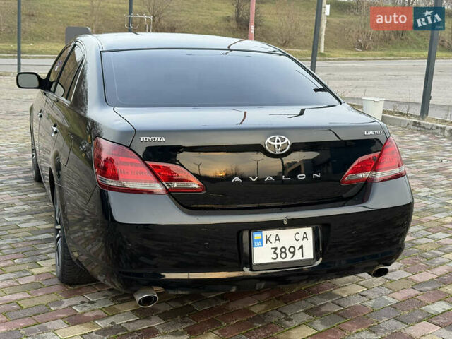 Черный Тойота Авалон, объемом двигателя 3.46 л и пробегом 245 тыс. км за 8700 $, фото 1 на Automoto.ua