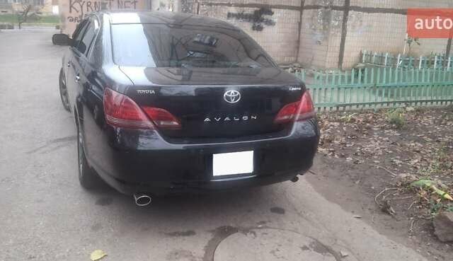 Черный Тойота Авалон, объемом двигателя 3.5 л и пробегом 220 тыс. км за 10500 $, фото 2 на Automoto.ua
