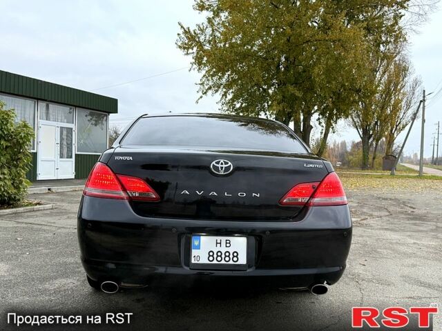 Черный Тойота Авалон, объемом двигателя 3.5 л и пробегом 338 тыс. км за 10888 $, фото 2 на Automoto.ua
