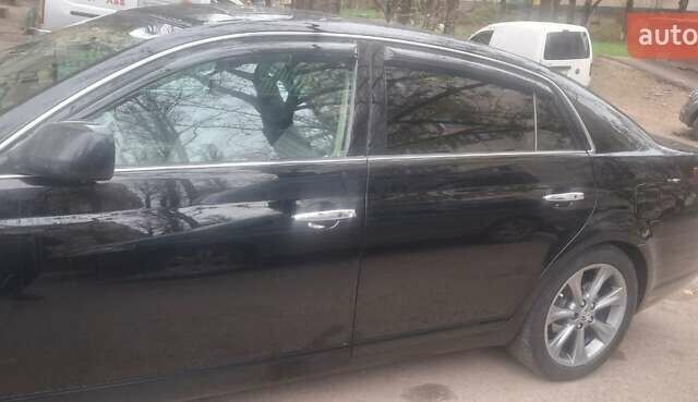 Черный Тойота Авалон, объемом двигателя 3.5 л и пробегом 220 тыс. км за 10500 $, фото 1 на Automoto.ua
