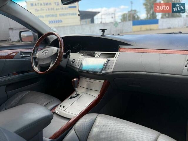 Серый Тойота Авалон, объемом двигателя 3.46 л и пробегом 405 тыс. км за 6850 $, фото 103 на Automoto.ua