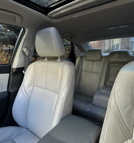 Серый Тойота Авалон, объемом двигателя 2.49 л и пробегом 279 тыс. км за 14500 $, фото 17 на Automoto.ua