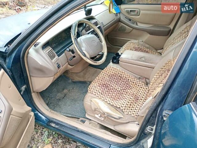 Зеленый Тойота Авалон, объемом двигателя 3 л и пробегом 100 тыс. км за 2500 $, фото 4 на Automoto.ua