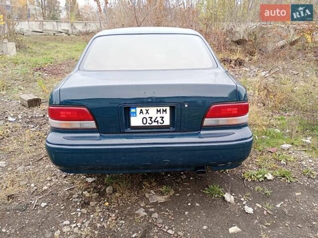 Зеленый Тойота Авалон, объемом двигателя 3 л и пробегом 100 тыс. км за 2500 $, фото 1 на Automoto.ua