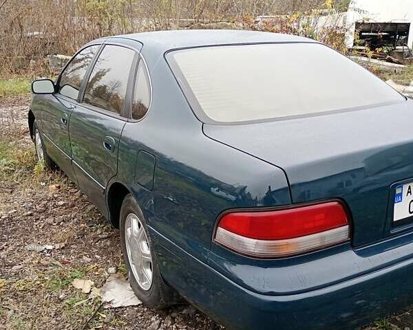 Зеленый Тойота Авалон, объемом двигателя 3 л и пробегом 100 тыс. км за 2500 $, фото 5 на Automoto.ua