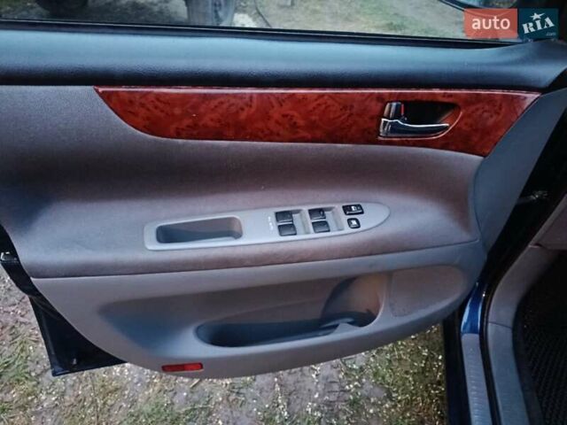 Синій Тойота Авенсіс Версо, об'ємом двигуна 2 л та пробігом 285 тис. км за 5900 $, фото 26 на Automoto.ua
