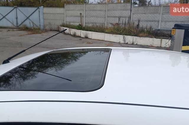 Белый Тойота Авенсис, объемом двигателя 2 л и пробегом 550 тыс. км за 3800 $, фото 4 на Automoto.ua