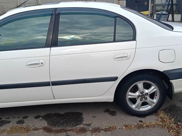 Белый Тойота Авенсис, объемом двигателя 2 л и пробегом 399 тыс. км за 3800 $, фото 5 на Automoto.ua