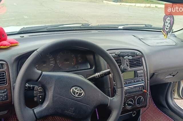 Белый Тойота Авенсис, объемом двигателя 2 л и пробегом 550 тыс. км за 3800 $, фото 7 на Automoto.ua