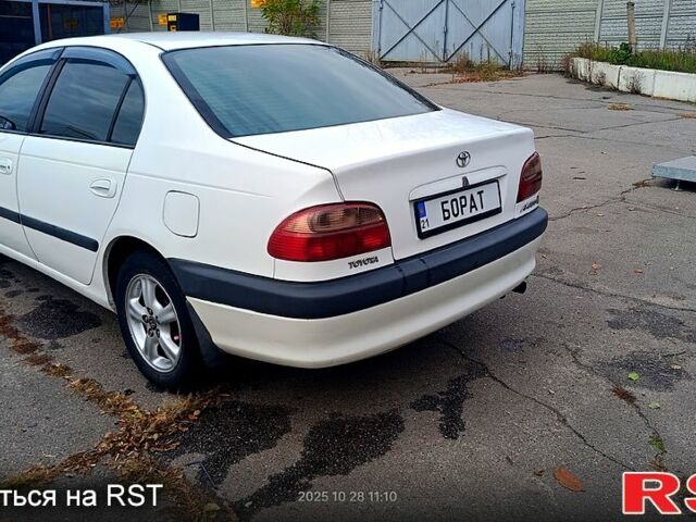 Білий Тойота Авенсіс, об'ємом двигуна 2 л та пробігом 550 тис. км за 3800 $, фото 4 на Automoto.ua