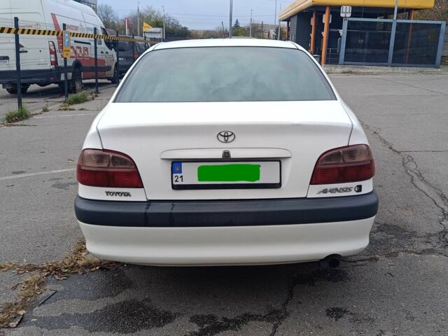 Белый Тойота Авенсис, объемом двигателя 2 л и пробегом 399 тыс. км за 3800 $, фото 10 на Automoto.ua