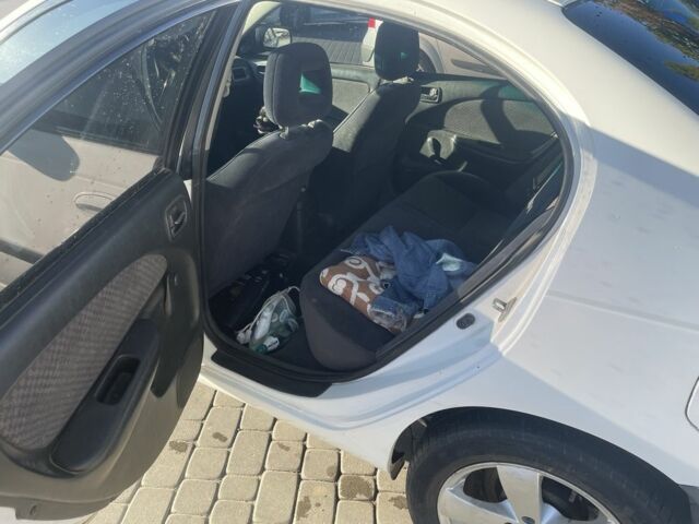 Белый Тойота Авенсис, объемом двигателя 1.8 л и пробегом 228 тыс. км за 4200 $, фото 7 на Automoto.ua