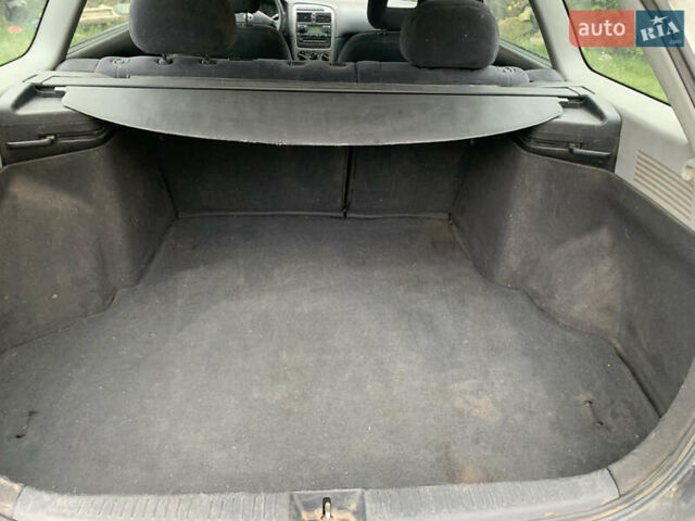 Белый Тойота Авенсис, объемом двигателя 2 л и пробегом 250 тыс. км за 3600 $, фото 11 на Automoto.ua