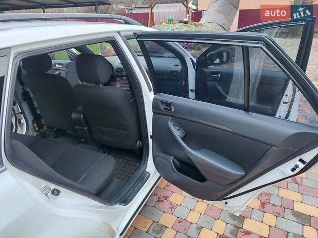 Белый Тойота Авенсис, объемом двигателя 2 л и пробегом 376 тыс. км за 5700 $, фото 18 на Automoto.ua