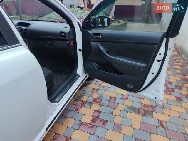 Белый Тойота Авенсис, объемом двигателя 2 л и пробегом 376 тыс. км за 5700 $, фото 13 на Automoto.ua