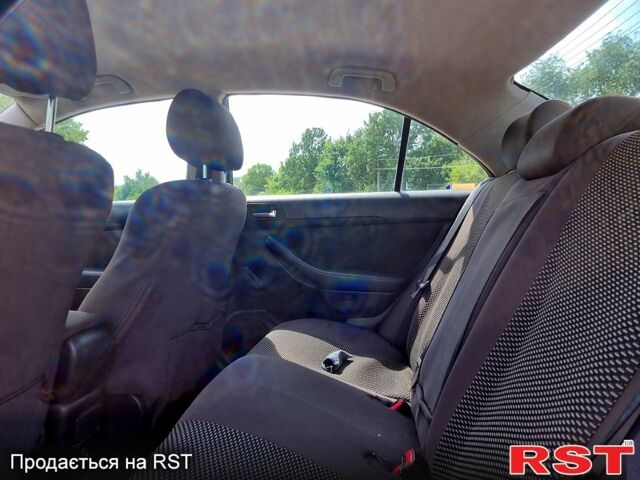 Бежевый Тойота Авенсис, объемом двигателя 1.8 л и пробегом 350 тыс. км за 5000 $, фото 6 на Automoto.ua