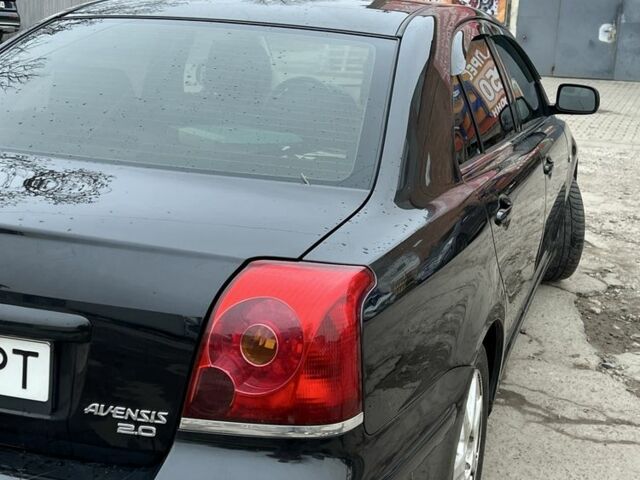 Черный Тойота Авенсис, объемом двигателя 2 л и пробегом 363 тыс. км за 4500 $, фото 2 на Automoto.ua