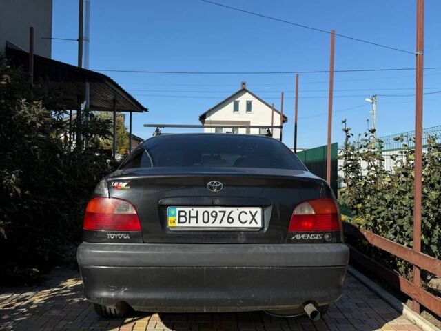 Черный Тойота Авенсис, объемом двигателя 1.8 л и пробегом 400 тыс. км за 2599 $, фото 3 на Automoto.ua