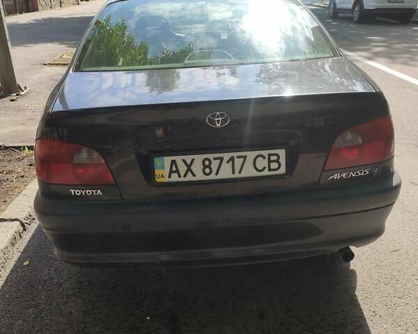 Черный Тойота Авенсис, объемом двигателя 2 л и пробегом 290 тыс. км за 3400 $, фото 1 на Automoto.ua